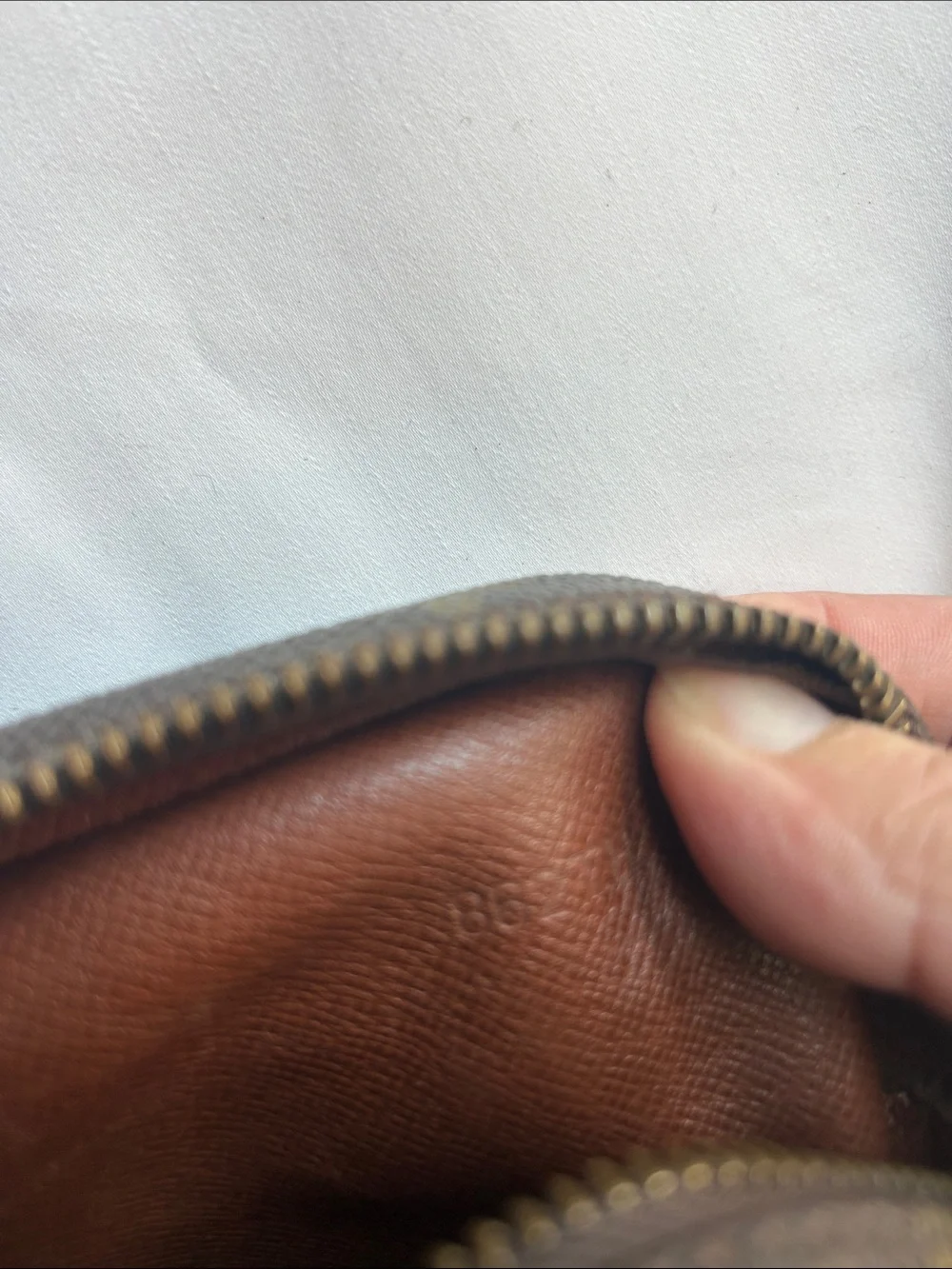 Louis Vuitton Monogram Wristlet in Brown and Tan